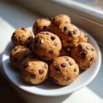 A pile of no-bake chocolate chip energy balls, perfect for a Lunchbox Dessert First Bento.